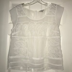 Sheer white cap sleeve blouse